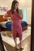 I wore this dress to my husband's Fire Dept Banquet and received tons of compliments. Flattering in every way and extremely comfortable! Shows enough curve but not overly revealing. As a mama of two, it made me feel very confident. Color is a light mauve - Kaitlyn C.