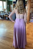 I ordered this dress in hopes that it would fit for my senior prom, and it fits me perfectly! I like it a lot because it is actually a very fancy looking dress. Some dresses on this website can be a little casual, but this one is definitely fancy and sooo pretty. I am 5' 1" and with some high heels it barely drags to the ground. So just a heads up for very tall people. I also love the back and the front leg slit. So classy! The glitter in person also adds a touch of elegance. 10/10 recommend! - Tina F.