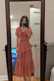 I really like the dusty rose color and the length. I'm barely 5'4 and this dress hits me right above my ankles. I don't feel that the slits are that high. I got a xxs and it is slightly big around my waist and hips. Yes, the bust area is big but it's not a big deal. I'm contemplating on whether to keep this dress or not... I originally bought this dress for an engagement photoshoot but since it's quite loose, I don't know how it will photograph. As for the quality, I would say it's pretty fair. There are some undone threads on the side zipper that gets stuck in the zipper. - Miso C.