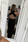 This jumpsuit fits like a dream and is super flattering! I felt like a model wearing it. I'm making my husband taking to fancy places just so I can wear it more! - Kelly F.