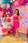 I'm not typically someone who shows my stomach, but I loved the look of this two-piece set and I'm so glad I went for it! I got so many compliments on it. The material has a nice stretch which I loved because I have muscular legs and I was able to feel comfortable in it. It shows just enough while still being very classy and the color is so fun!! I got it for a bachelorette party in Miami, but I can see myself wearing it many more times. I was also pleasantly surprised with the quality for such an affordable price point. This was my first Lulus purchase and it definitely won't be my last! - Courtney V.