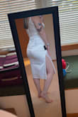 This is a super cute dress, but I went with something else. It's super comfortable & has a little stretch in the satin part. The top was a little big for me so I had to have the straps pretty tight. (I'm wearing Spanx that are too high in the second pic, so ignore the opaque line on my back) - Megan C.