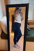 I couldn't get this to look quite right on me but it is a super cute top! The material is a little stretchy. - Megan C.