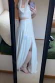 I would've had to wear heels or get this dress hemmed as it is very long. It's a very cute dress but it just overpowered me, unfortunately! I also should probably have been in a large, so this is a little tight on me! - Megan C.