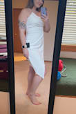This dress is SO comfortable. There's a little bit of rubber to help keep the dress up. The top is a little big on me, but with a bra, I think it will be perfect. I plan on wearing this for my bachelorette party! - Megan C.