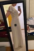 I think the dress felt secure enough, it just was a little too simple for me. On the right person, this would be a really cute dress! I liked the wrap & the little sleeves. - Megan C.