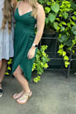 I have this dress in dark green (size small) and white (size large). I absolutely love it. It is tight and flowy in all the right places. It's super comfortable & the chest is secure so I won't be worried about falling out. I plan on wearing the white for my bridal shower! - Megan C.