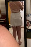 This set was somehow too big and too small on me at the same time. It's so cute on people who fill it out right but that wasn't me. It ends up kind of looking like a paper bag on my body. It has a really cute back on the top! I think the top fit me better than the skirt. - Megan C.