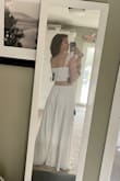 I felt very boxey looking in the top personally, but it was really comfortable! I loved the skirt. The material is really soft and very well made. I didn't like how far down the skirt came on my stomach when I relaxed, if I was able to have a M top and a S bottom it might have worked a little better but cute! - Rylie S.