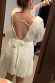 The dress fit me perfectly, I was very happy with the sizing. The only thing to be aware of is that the embroidery looks a little cheap, but it's white on white so it really just adds texture. All in all very happy! - Kayla S.