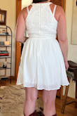 I originally was planning a courthouse wedding and then heading out to go country dancing at a local ranch and next year we would do a big thing. That has since changed and we are now doing a microwedding this year. That is the only reason I did not keep this dress. It would make a great dress to go two stepping in! the cut is flattering to individuals built like me!
Ignore the goofy face and unflattering picture angle LOL - Caitlin H.