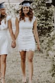 I got this dress for my graduation and graduation pictures with my best friend. It was absolutely perfect! I loved the fact it is fitted and has an open back. I got so many compliments on it! - Chloe D.