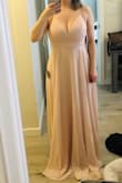 I love this dress. The back is so pretty and dainty. It does show a lot of cleavage but has good support. It is long for my height so I had to get it hemmed. - Aaron L.