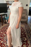 I really wanted this to be the dress so I could wear the crop top at my backyard reception with shorts or a skirt that matched my theme colors. Sadly the zipper of the skirt was broken, also because of the style the skirt poofs out immediately after the band which isn't super flattering. If you are a person with wide shoulders, be prepared not to be able to raise your arms without showing under-boob. All in all, it just didn't end up being the winner I wanted it to be. - Rose W.
