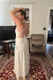 This dress was in my top three! It was actually a bit shorter than I wanted it, I'm also 5'9 so that happens a lot. It was surprisingly light for the lace on top and I loved the back. Part of the reason, outside of it being slightly too short, It wasn't my top pick is because I have no idea what bra would have worked with this dress. Most likely a stick on, which is a bit of a risk in the Florida heat and humidity. - Rose W.