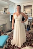 This is my dress for my last minute elopement/micro wedding!

I originally hesitated before purchasing this dress, I ordered it in the 2nd round of wedding dresses plus some reception outfit options. I'm glad I took the risk, this dress fits beautifully! I won't need to do any alterations, I did want to spice it up a bit so I'm going to pair a sparkly belt with it to give it. It's the perfect fabric weight for a Florida wedding with pictures outside of the church in a little park. It's a lovely length on me, I can wear a kitten heel which is my favorite - Rose W.