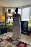 I kept this dress, it may be the one for my wedding! Fit true to size, very fitted. Sleeve straps a little snug. Slit not too high, if you have large chest it is pretty revealing. Stretchy and comfy, might look into some ruching for the tummy area and other slight modifications to personalize it. - Ashontae L.