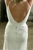 We are celebrating 25 wedding anniversary and renewing our vows in July. S, excited to wear. I will need to have the straps changed due to needing them to adjust all the way towards the front. Works great with 3-inch heels to not have it hemmed. - Nikole M.