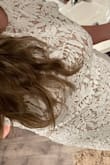 I am so pleased with the material and the fit of this dress! Absolutely stunning. Bought it for my bridal shower and it's just so classy yet elegant I'm so excited to wear it. - Ariel S.