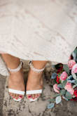 I got these shoes to wear for my wedding ceremony and then my party. These were super cute and beautiful! They looked perfect in photos, but that's just it. They were sooo uncomfortable, I had to take them off midway while taking our wedding photos! My dress also kept getting caught on the rhinestones, and they also kept falling off. I probably lost a good 8-10 stones on each show. As for the party, I only kept them on for like 30 minutes and immediately changed out of them. - Leslie V.