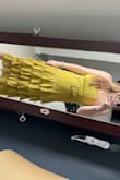 Fits me well! Love the color, especially with a tan. Wishing I also ordered the red one. Very fun. Need to steam but love the frills. - Lindsay F.
