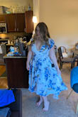 The top didn't fit well. But the dress is very pretty! - Cecelia A.