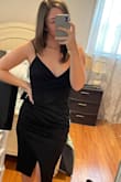 Thick good quality black dress. The top is a little revealing if you cannot fill it out completely which is my issue but it still worked great and can be worn many ways. - Lauren R.