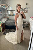 I was a little skeptical ordering online for the fear it wasn't going to be good quality, but let me just say Lulus knows what they are doing! The second I put this dress on I knew it was the one! I ordered a medium and it fits me like a glove, I am gonna make two alterations one at the buttons on the back of my neck, I need to take it in just a tad, and I personally want the slip attached to the lace at the slit (but that one is just a preference not necessary). I will definitely recommend Lulus to anyone looking for a beautiful dress! - Mandalina Q.