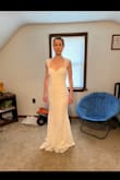 Pretty bright white dress with gorge detail. - Katelin Z.