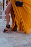 I love them and they are the cutest pair of wedges I've ever seen. The straps do fall down a lot unless you tie them super tight, then you run into the issue of rubbing but honestly, I'm not even mad at it. This is from me wearing them once so I'm sure I'll figure those straps out. - Sherera B.