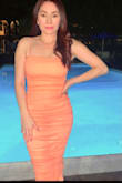 Stunning color! Not too tight just the right form fitting! - Martha M.