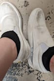 I bought these because i needed some white shoes to wear to my rehearsal dinner (1st pic). I also could use a pair of slip-ons, and these are great for that! they are a tad big like most reviews say. I am usually between a 7.5-8, so i ordered the 7.5 and i would hesitate to go down another half size even. they fit perfect with socks. definitely a staple for my closet now!
For the first few weeks of wear they held up great, but I noticed the other day that the rubber platform sole is coming completely off . Nothing a little superglue can't fix, but I was surprised at how clean it was coming off, as though whatever adhesive they used had just stopped working all at once. Since these are white canvas, they get dirty pretty easy, but I wear them to the library where i work, where the floors are covered in dust from all the books, so the 2nd pic shows more dirt than typical use. I haven't tried to clean them yet.
Would definitely buy again, despite the couple of issues ive encountered!! - Rachel W.
