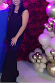 Bought this dress for my formal engagement and it was the perfect black dress with a touch of pop. The materiel was amazing and fit to my body just perfect. It wasn't too thick and therefore comfortable and breathable. It has stretch which allowed me to move the way I wanted and it also doubled as a beautiful wedding guest dress. Only down side was that it was LONG so I would watch out for that with my short girls. Would highly recommend! - Tracy G.