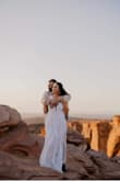 I ordered this last minute and was amazed at the quality, the fit, the entire dress! I wore it for my elopement and had so many compliments! It runs true to size and the length was even perfect with heels! No alterations needed! - Melanie P.