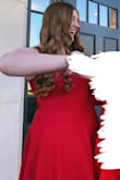 I ordered this dress for sorority recruitment and have worn it to a second sorority event, it is a beautiful shade of red!! My problems with this dress are that the zipper isn't the best quality (very different zipper than other Lulus dresses I've ordered) and the seams in the top half of the dress along the chest area are a little strange and though they aren't very noticeable in photos, I just feel like they aren't that flattering on. These two problems aren't big enough to take away from thinking the dress is pretty, I think it photographed really well! I do like this dress, it's just not my favorite of the dresses I've ordered from Lulus. If there was a different style of this dress in this color of red I'd be very interested to look into it! Also sorry these aren't the best pics to show off the dress but it's all I have! - Haydon L.