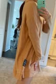 I think this is a super oversized sweater but cannot be worn as a dress (unless leggings are worn under) I have a super long torso so it was wayyyy too short. Otherwise love this oversized sweater! - Cassandra R.