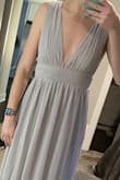 Got an XS because I noticed it looked larger in the bust on photo reviews but it didn't fit. This color also washed me out since I have fair skin. Cute but not my style. - Cassandra R.