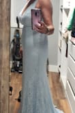 I ordered this for a wedding dress and I honestly figured I would be returning it. The first one I even tried but it is so darn cute that I will be keeping it. It absolutely fits perfectly. I don't even have to wear a bra with it because it hugs the jugs and keeps them where they should be. I am a 36 E or F so I was a little worried. I wasn't sure it was going to zip up but it has a little give to it so I got it zipped and then I was so excited to see how well it fit. For the price, it is a steal!! I only have my try-on pics so they will have to do for now!  Thanks, Lulus for a great, inexpensive dress!! Love it! - Lori A.