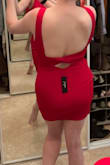 This dress is really comfy and the material is stretchy. I had a little trouble getting the zipper all the way up. Also not super flattering if you have any tummy fat. Definitely going to buy some skims to help make the dress more flattering. - Paige O.