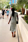 This dress is form-fitting with slits on the sides so it makes you look sexy, but you will still look classy.  I wore it while in Las Vegas and friends seeing my photos kept asking where I got this dress from. - Celine A.