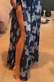 Omg this is so comfy and flowy I could wear it to bed. The strings/tie add a little more flair to the dress. SO LONG in me and I have a very hard time finding clothes long enough. Great for tall gals, shorter gals may be swimming in it. - Heather E.