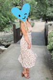 I loved this dress for an outdoor spring/summer wedding! It ended up being perfect for the garden party vibe! My only complaint (and there is nothing to do about this) is that the back tie up is hard if you have a bigger bust - you need to tie the back tight enough to hold up the front and it ended up being a little uncomfortable for me, as I wanted a little more coverage in the front! Other than that, beautiful dress! - Hailley W.