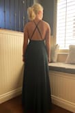 It is amazing!!! I love the fit love the open back it's just so beautiful! It's long, but with heels it is thr perfect length. I got the green colour and absolutely love it on my pale skin. - Jade O.