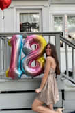 The dress was gorgeous, it was perfect for my 18th birthday party. I loved the color and it looks amazing in the pictures, it photographs really good. I also loved the fact that it had pockets. The material was nice and there's a black layer on the inside so that it's not see-through. The only thing I wasn't obsessed with was the neckline, it wasn't flattering on me and the back part of the skirt was slightly too short for me. The front was still gorgeous tho and as said before it made me look really cute at the party! - Eleonora D.