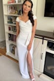 Wore this to my bridal shower and got so many compliments during and after the shower! The fit was perfect, didn't even have to alter it. Wore a 4-inch heel. Can't recommend it enough!! - Nicole S.