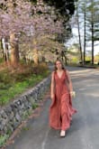 My daughter wore this dress to prom last weekend, and it fit perfectly right out of the package. All it needed was a quick steam at the dry cleaner to be party-ready. She received so many compliments, and her date was beyond impressed! As her mom, I find it age-appropriate for a 17-year-old - it doesn't reveal too much but is still feminine and made her feel like a princess! And the color - perfect with the cherry blossoms in Japan! - Michelle L.
