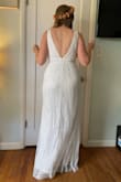 This is the wedding dress I was looking for! Elegant, shapely, affordable. Has a beautiful design with beads and sequins. It's moveable for dancing and just the right length with some heels. I love the back. I thought the front would be too low for my taste but I ended up embracing the curves! Very happy with this purchase. - Vanessa O.