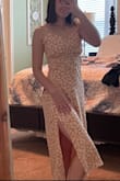I love the fit of this dress. It's conservative without being frumpy. The material is cool and lightweight but not clingy or see-through. The straps adjust quite a bit, and the slits on the sides are flattering on a shorter gal! Only marked as "little large" because I don't think it's fitted like the description, but it doesn't fit loosely in a bad way. - Tenley J.