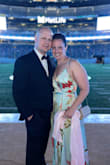 I sized down and it fit perfectly! I wore 3" heels, and it was just a tiny bit long, but I didn't have it hemmed. If you are shorter than 5'5" or plan to wear lower heels, plan to hem. The straps are adjustable and the dress is lined and it draped beautifully after steaming it. - Joy-Michele J.