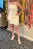 This dress was adorable in the back and a good length, but with a curvier frame, I did have to pull down the dress at times. The chest area was a little looser but still looked great. Got many compliments! - Natalie J.